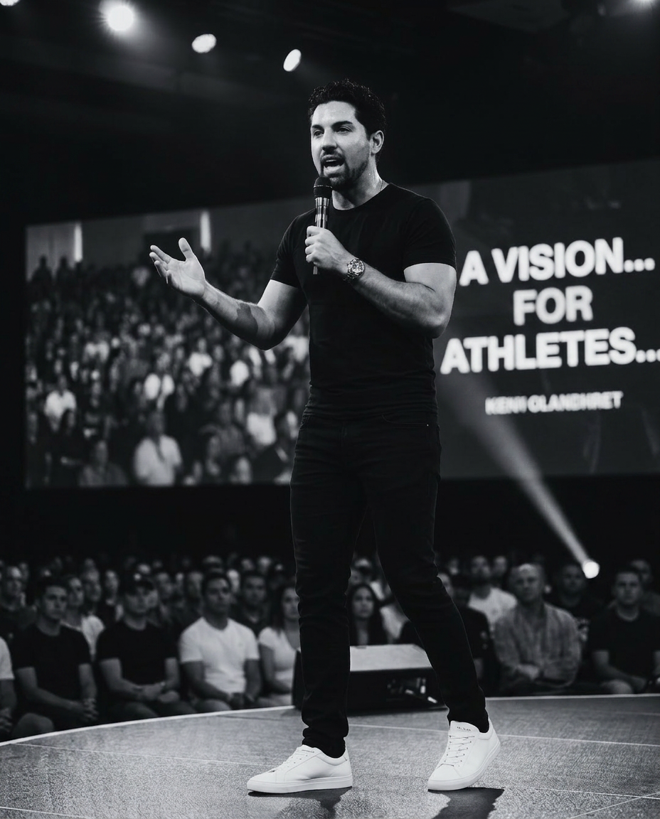 Jordan speaking on stage