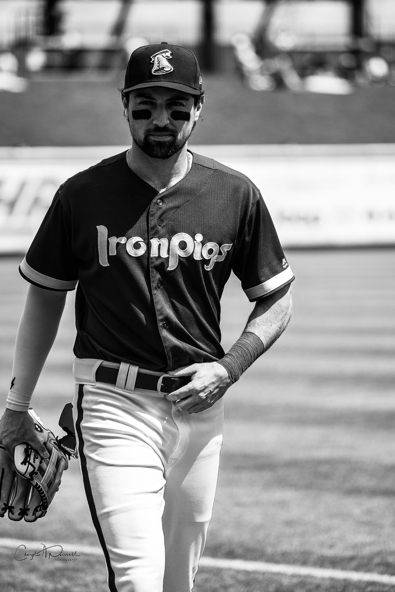 Jordan walking off the field in uniform with his glove